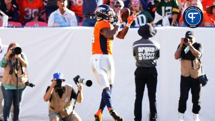 Denver Broncos wide receiver Courtland Sutton (14) pulls in a touchdown in the second half against the Green Bay Packers at Empower Field at Mile High.