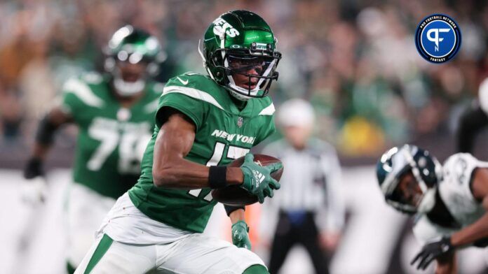 New York Jets wide receiver Garrett Wilson (17) gains yards after catch during the second half against the Philadelphia Eagles at MetLife Stadium.