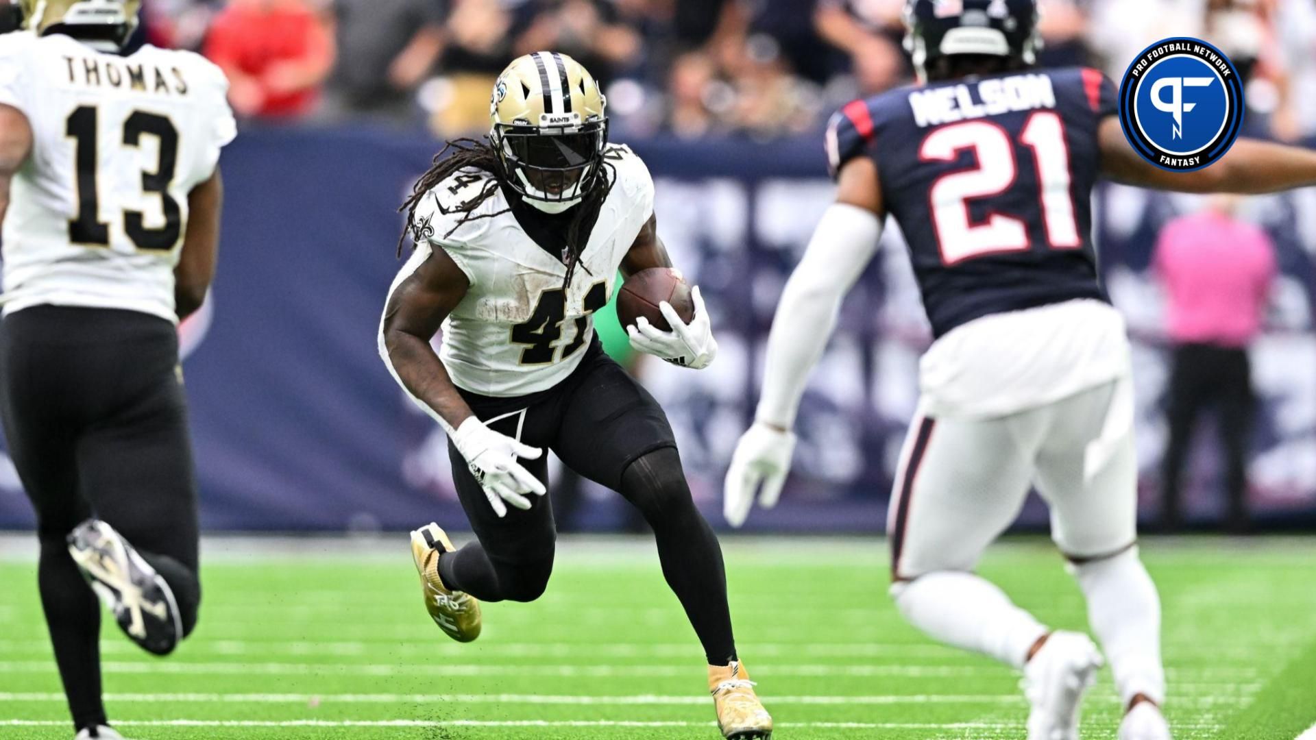 New Orleans Saints running back Alvin Kamara (41) runs the ball during the fourth quarter against the Houston Texans at NRG Stadium.