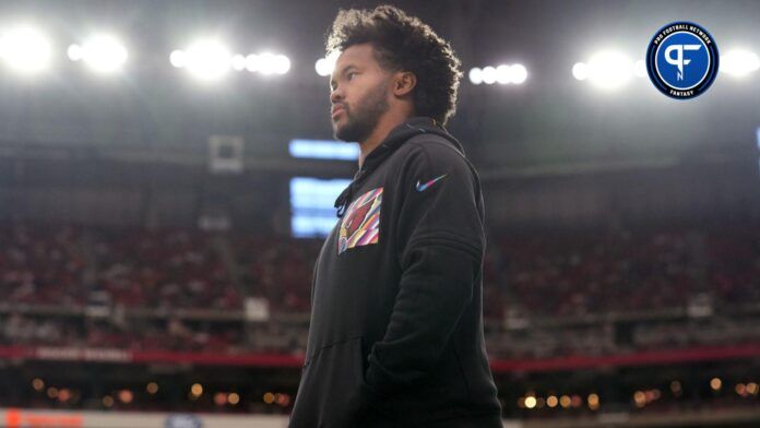 Kyler Murray watches his team from the sidelines as they play against the Cincinnati Bengals at State Farm Stadium.