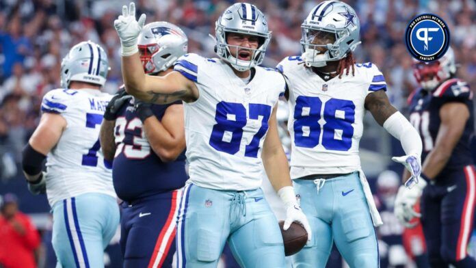 Dallas Cowboys tight end Jake Ferguson (87) reacts after a catch during the first half against the New England Patriots at AT&T Stadium.