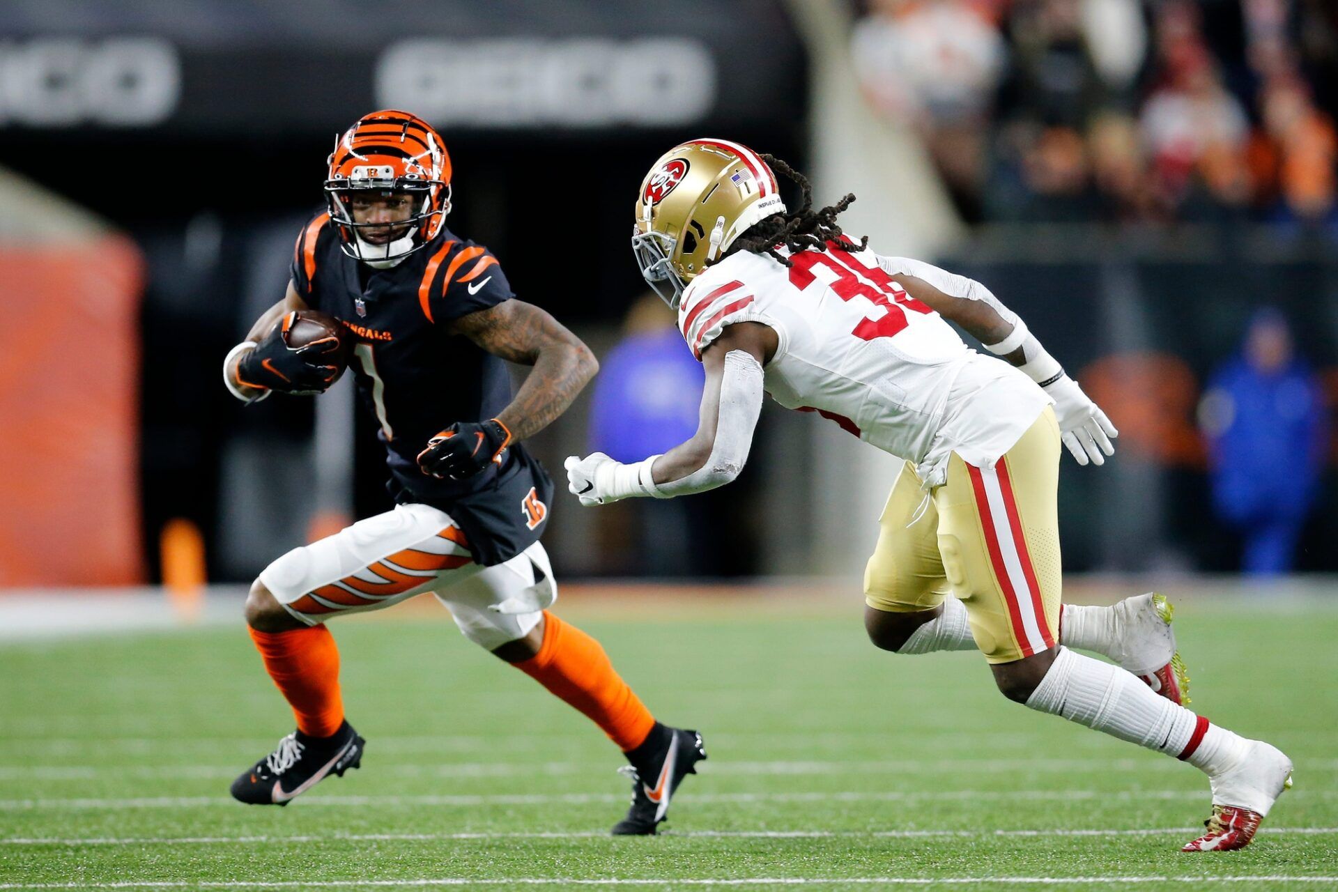 Cincinnati Bengals wide receiver Ja'Marr Chase (1) runs with a catch in the third quarter of the NFL Week 14 game between the Cincinnati Bengals and the San Francisco 49ers at Paul Brown Stadium in downtown Cincinnati on Sunday, Dec. 12, 2021. The Bengals tied the game in the fourth quarter, but eventually fell to the 49ers in overtime, 26-23.