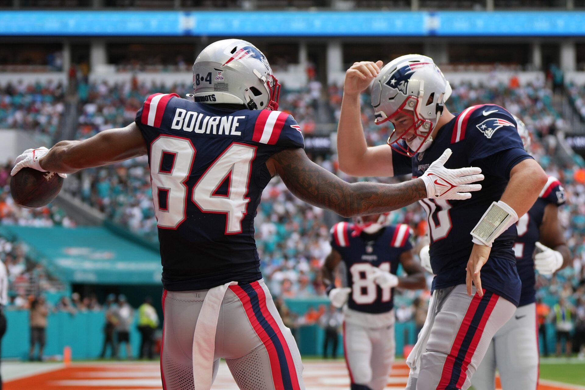 New England Patriots WR Kendrick Bourne (84) celebrates a touchdown against the Miami Dolphins.