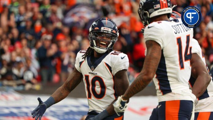 Denver Broncos WRs Jerry Jeudy (10) and Courtland Sutton (14) celebrate after a touchdown.