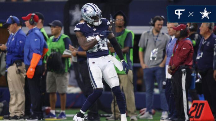 CeeDee Lamb (88) reacts after making a catch in the second half against the Los Angeles Rams at AT&T Stadium.