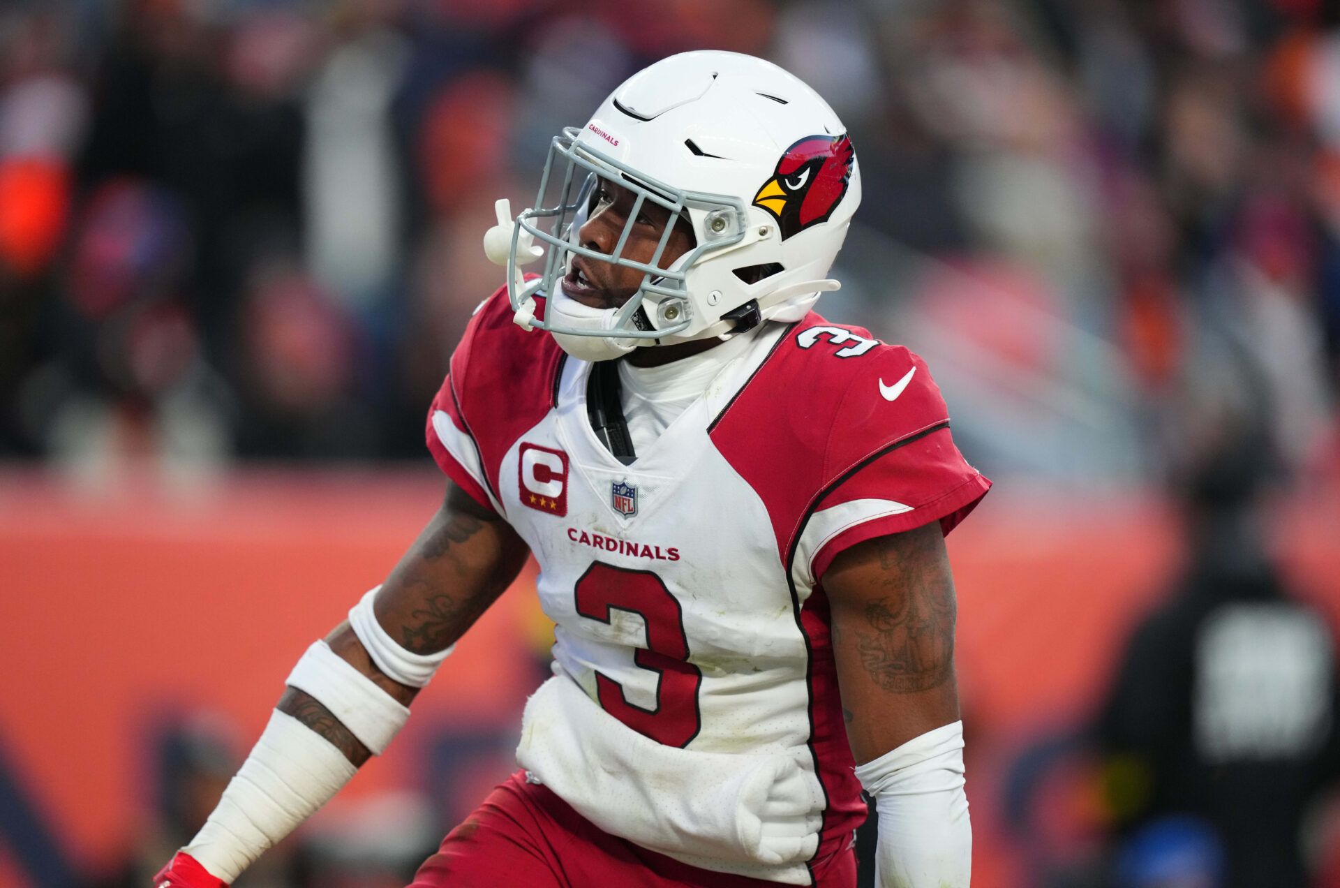 Arizona Cardinals safety Budda Baker (3) reacts to his interception in the second half against the Denver Broncos at Empower Field at Mile High.