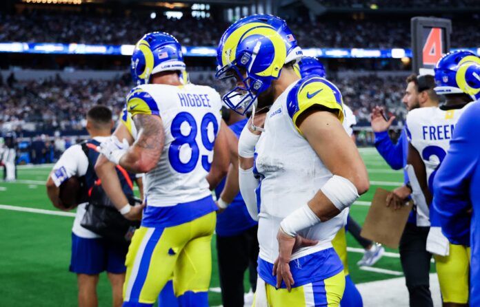 Los Angeles Rams quarterback Matthew Stafford (9) reacts on the bench during the second half against the Dallas Cowboys at AT&T Stadium.