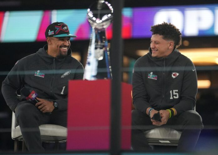 Patrick Mahomes, right, and Philadelphia Eagles quarterback Jalen Hurts, left, share the stage at the Footprint Center in downtown Phoenix.