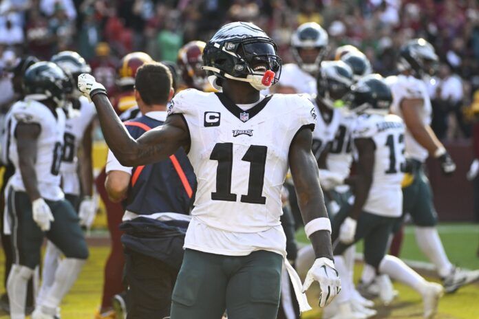 Philadelphia Eagles WR A.J. Brown (11) reacts after a touchdown against the Washington Commanders.