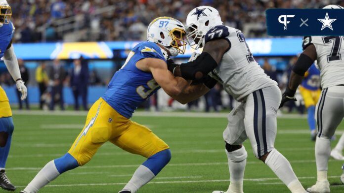 Los Angeles Chargers linebacker Joey Bosa (97) rushes against Dallas Cowboys offensive tackle Tyron Smith (77) during the third quarter at SoFi Stadium.