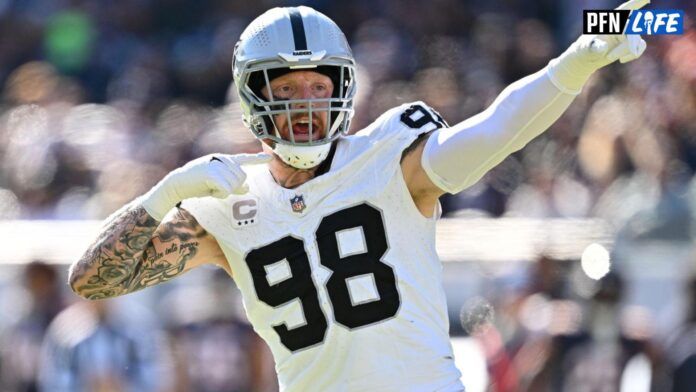 Las Vegas Raiders defensive end Maxx Crosby (98) reacts after the Chicago Bears jumped the snap in the third quarter at Soldier Field.