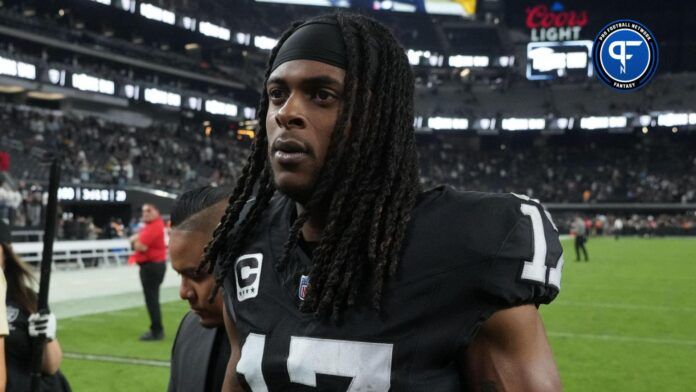 Las Vegas Raiders wide receiver Davante Adams (17) walks off the field after the game against the Green Bay Packers at Allegiant Stadium.