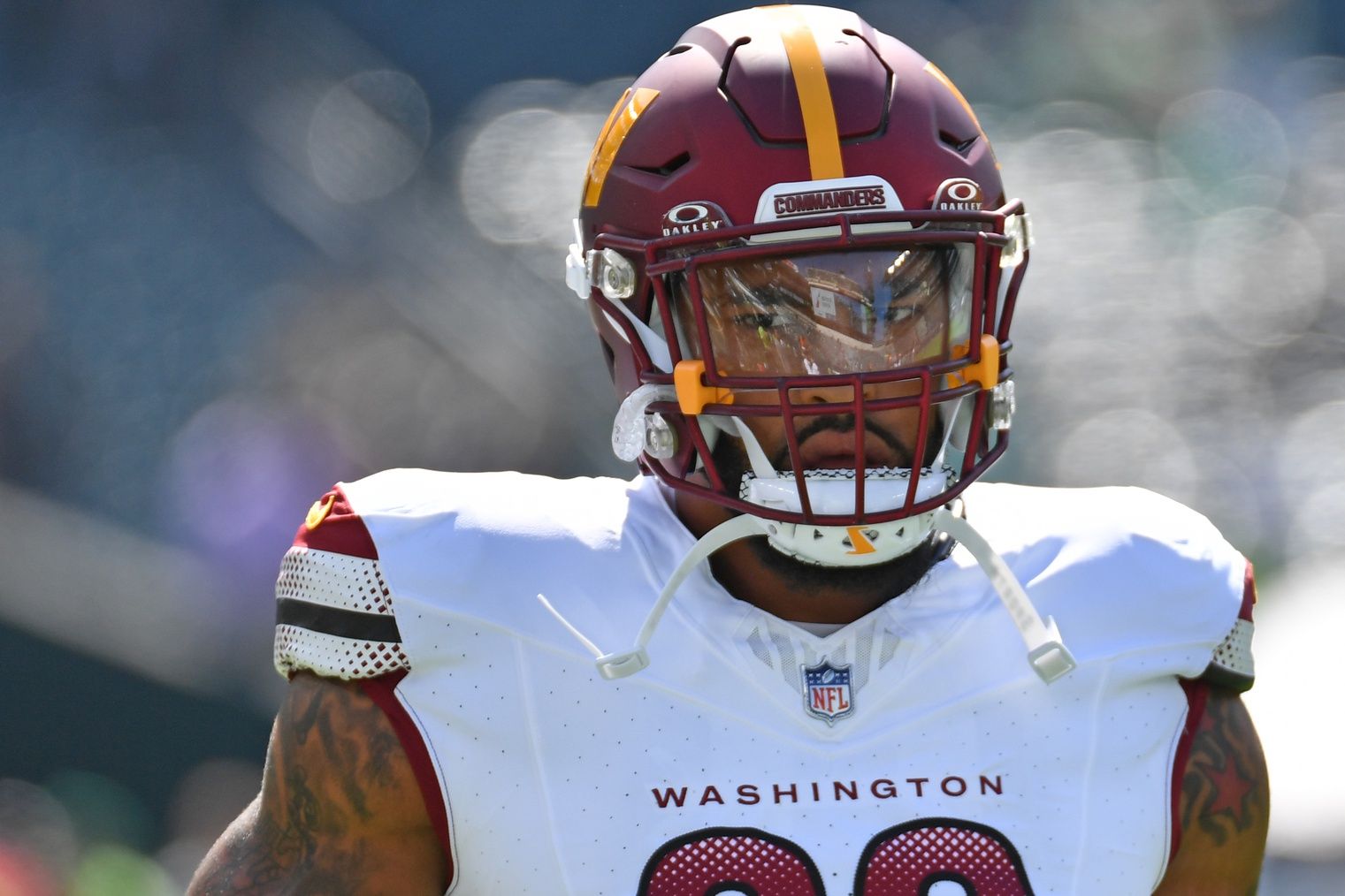 Washington Commanders pass rusher Montez Sweat (90) during warmups.