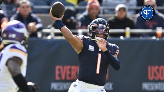 Chicago Bears quarterback Justin Fields (1) passes in the first half against the Minnesota Vikings at Soldier Field.