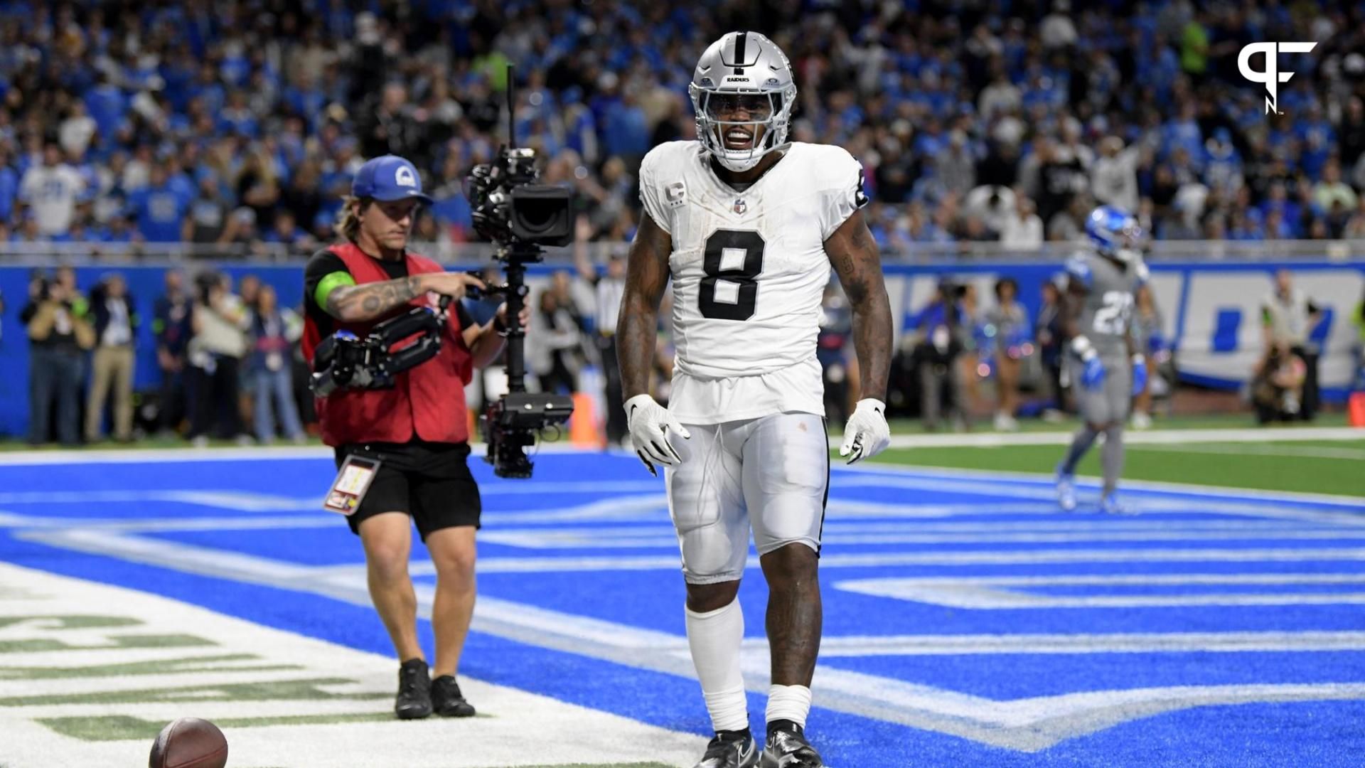Las Vegas Raiders running back Josh Jacobs (8) celebrates after running for a touchdown against the Detroit Lions in the second quarter at Ford Field.