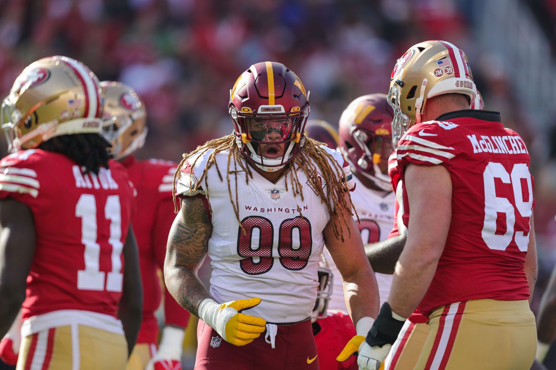 Washington Commanders defensive end Chase Young (99) reacts after a play during the second quarter against the San Francisco 49ers at Levi's Stadium.