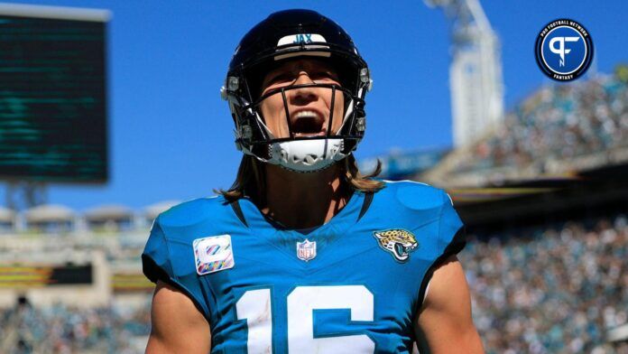 Jacksonville Jaguars quarterback Trevor Lawrence (16) yells after wide receiver Christian Kirk (13), not shown, caught a pass for a touchdown score during the second quarter of an NFL football matchup Sunday, Oct. 15, 2023 at EverBank Stadium in Jacksonville, Fla. The Jacksonville Jaguars defeated the Indianapolis Colts 37-20.