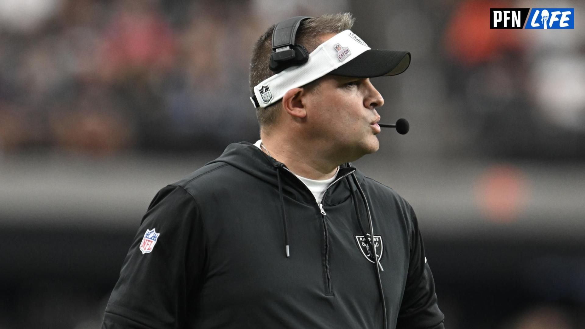 Las Vegas Raiders head coach Josh McDaniels looks down field against the New England Patriots in the fourth quarter at Allegiant Stadium.