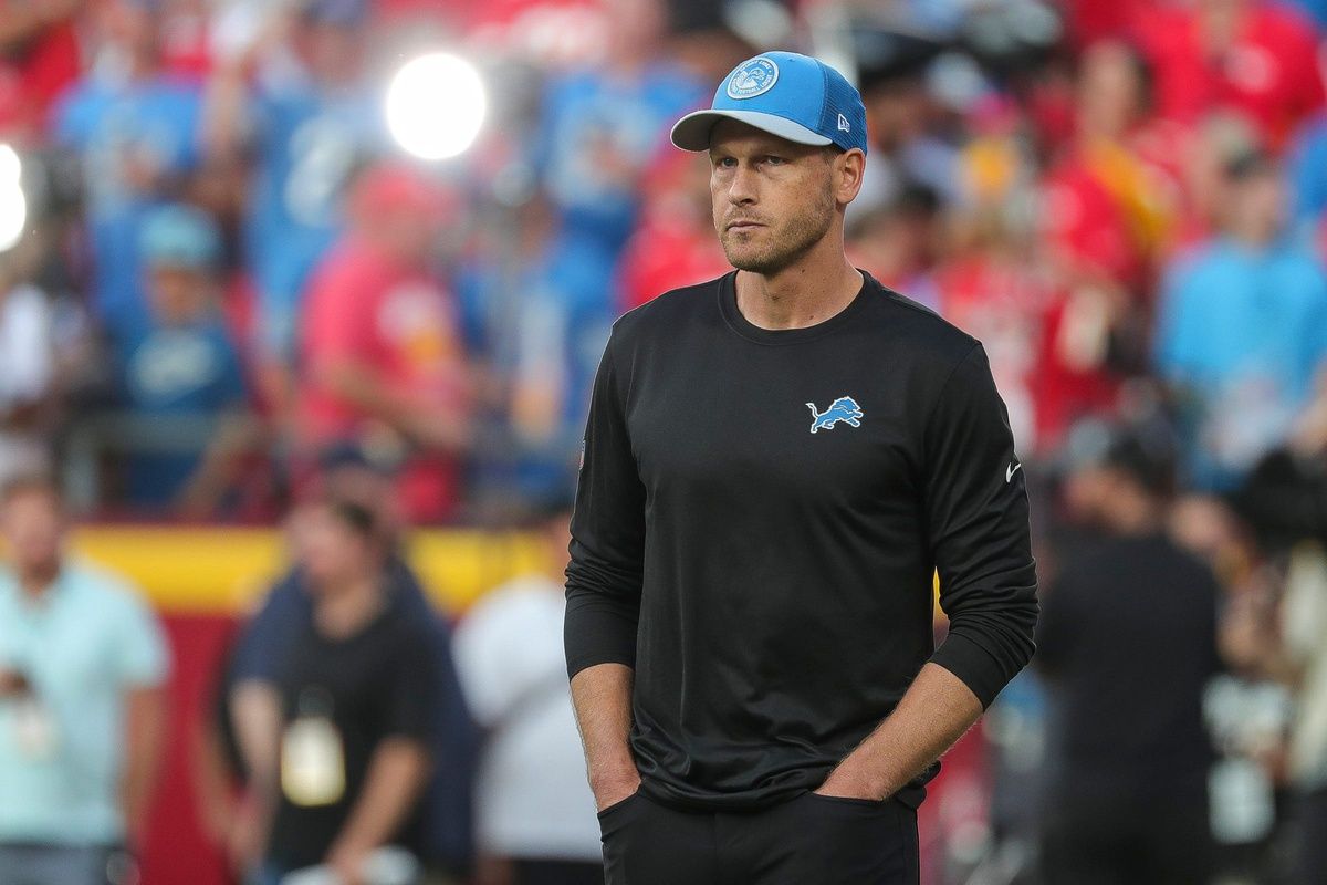 Detroit Lions offensive coordinator Ben Johnson watches warmups.