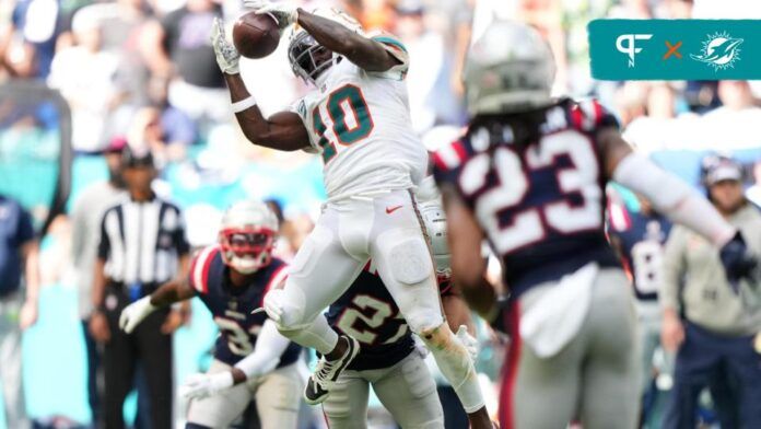 Tyreek Hill (10) makes a catch against the New England Patriots during the second half at Hard Rock Stadium.