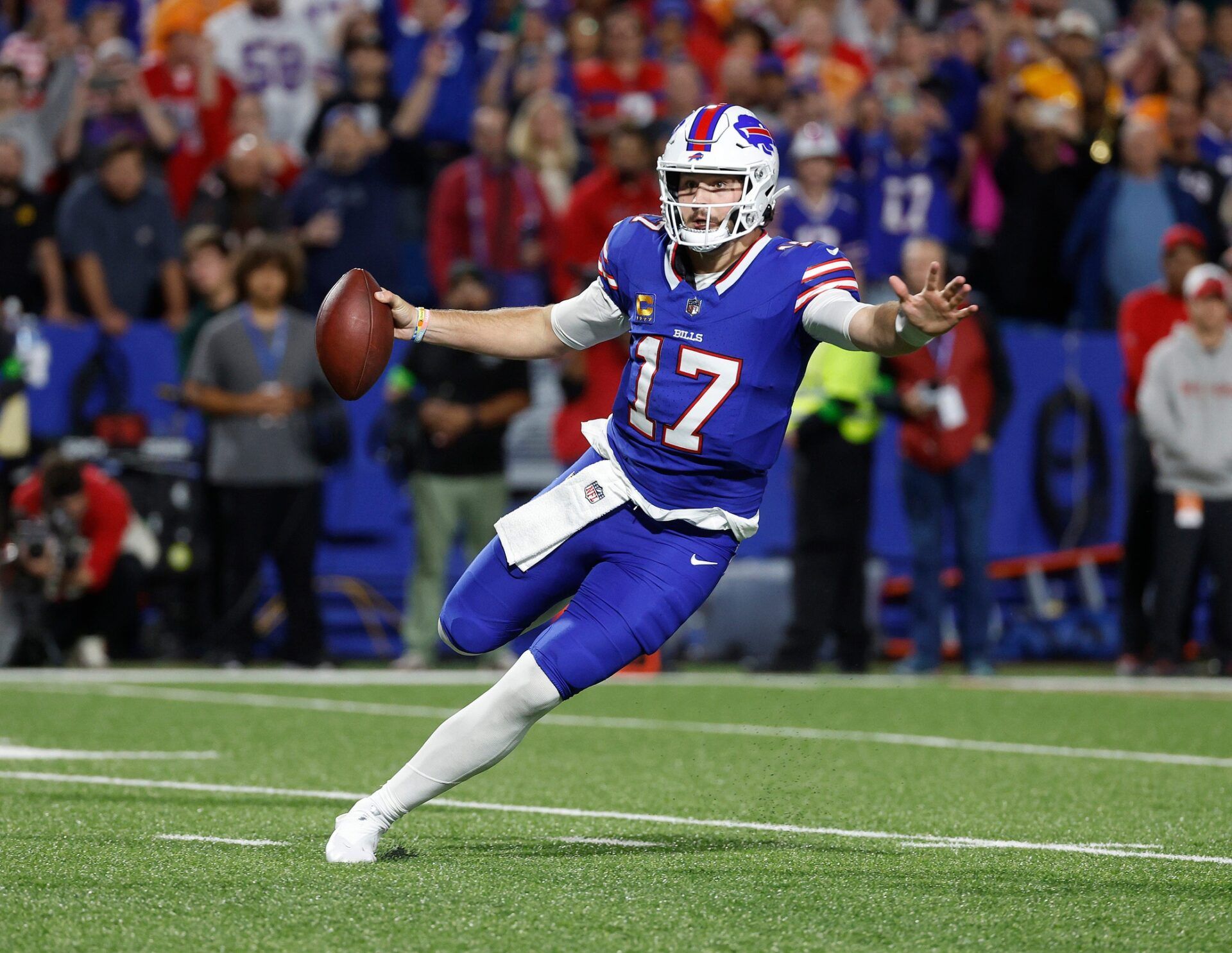 Josh Allen (17) finds running room against Tampa Bay.