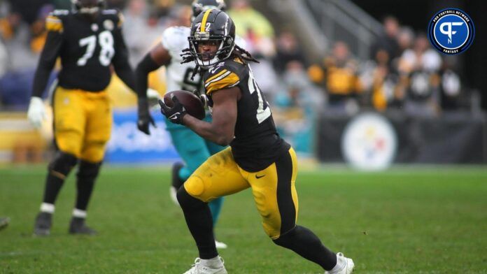 Najee Harris (22) looks to gain extra yardage after hauling in a pass during the second half against the Jacksonville Jaguars at Acrisure Stadium.