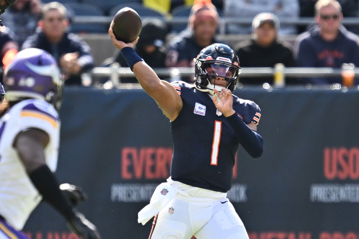 Chicago Bears quarterback Justin Fields (1) passes in the first half against the Minnesota Vikings at Soldier Field.