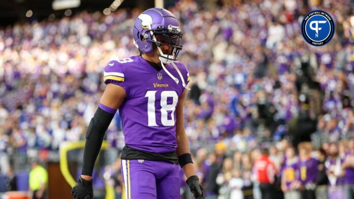 Minnesota Vikings wide receiver Justin Jefferson (18) looks on during warmups before a wild card game against the New York Giants at U.S. Bank Stadium.