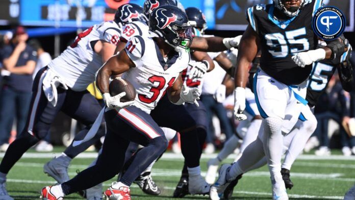 Dameon Pierce (31) runs in the third quarter at Bank of America Stadium.