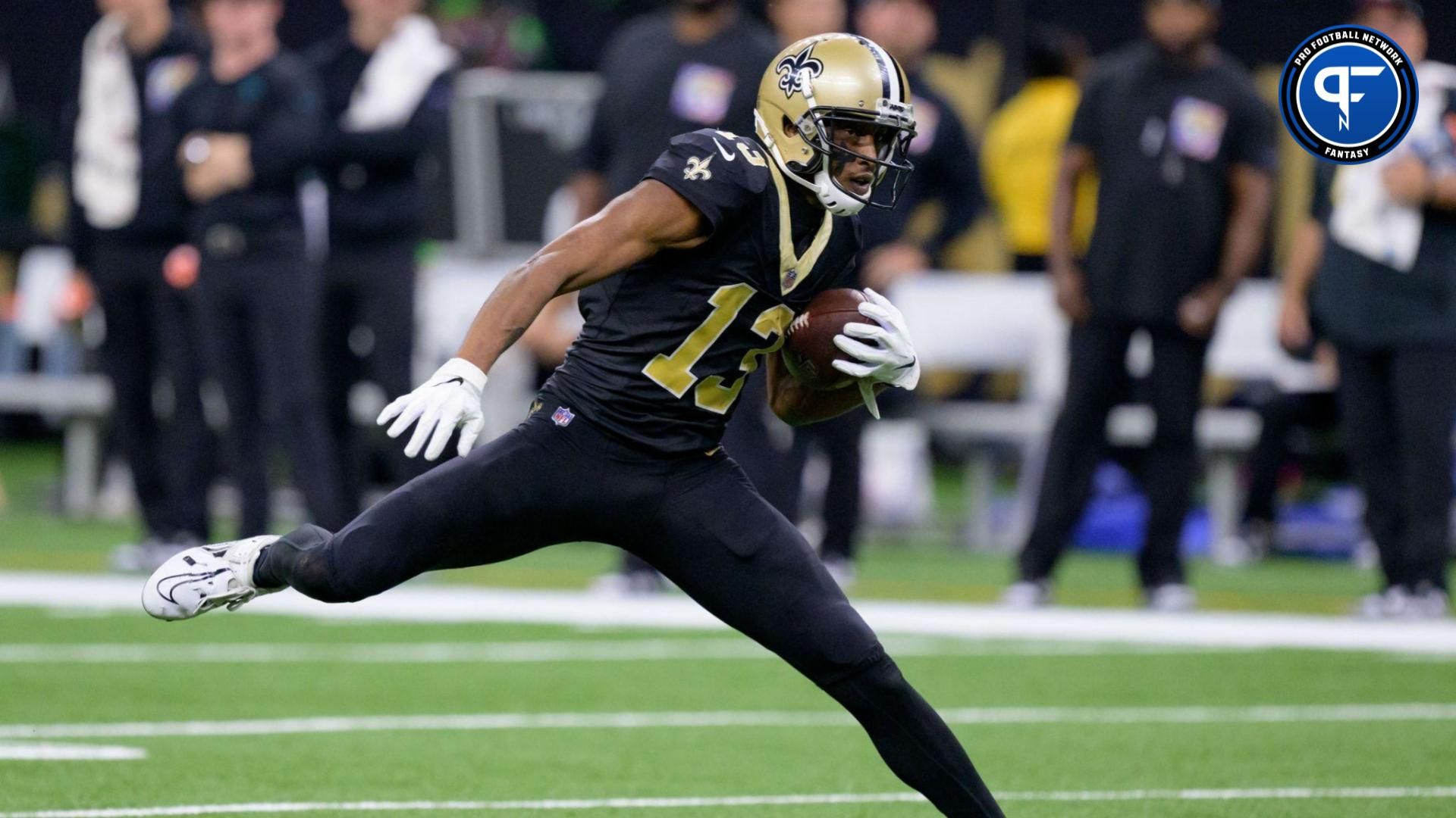Michael Thomas (13) runs after a completion against the Jacksonville Jaguars at the Caesars Superdome.