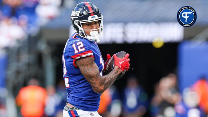 New York Giants tight end Darren Waller (12) catches the ball during the first half Washington Commanders at MetLife Stadium.