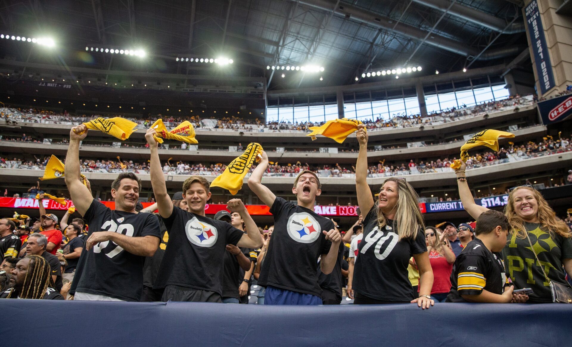 Pittsburgh Steelers fans wave their terrible towels while the Steelers play against the Houston Texans in the third quarter at NRG Stadium.