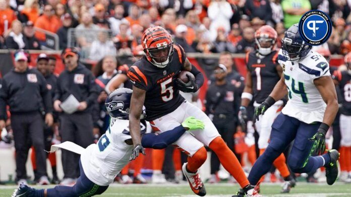 Cincinnati Bengals wide receiver Tee Higgins (5) turns downfield after completing a catch in the first quarter during an NFL football game between the Seattle Seahawks and the Cincinnati Bengals Sunday, Oct. 15, 2023, at Paycor Stadium in Cincinnati.