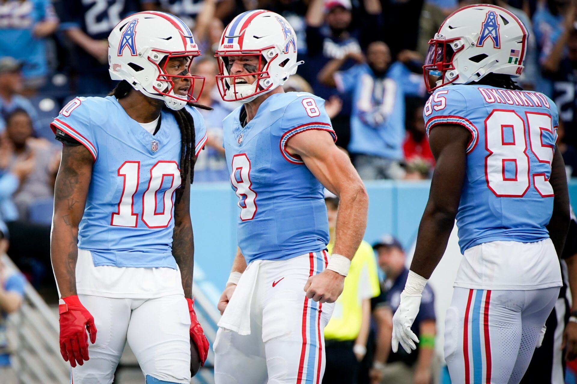 Tennessee Titans quarterback Will Levis (8) reacts after wide receiver DeAndre Hopkins (10) received a pass for a touchdown against the Atlanta Falcons during the first quarter at Nissan Stadium