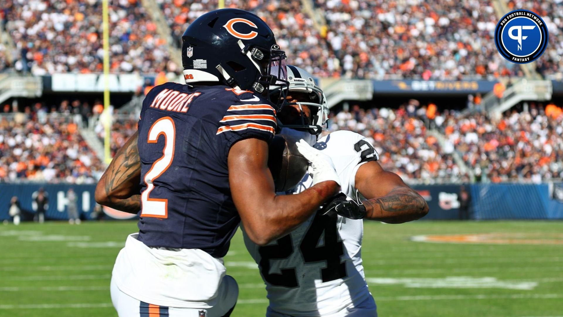 Chicago Bears wide receiver DJ Moore (2) attempts to make a catch against Las Vegas Raiders cornerback Marcus Peters (24) in the second half at Soldier Field.
