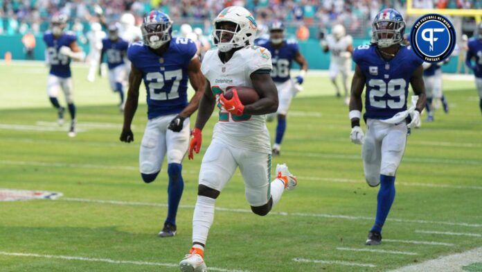 Miami Dolphins running back De'Von Achane (28) breaks free for a 76-yard touchdown run against the New York Giants during the first half of an NFL game at Hard Rock Stadium in Miami Gardens, October 8, 2023.