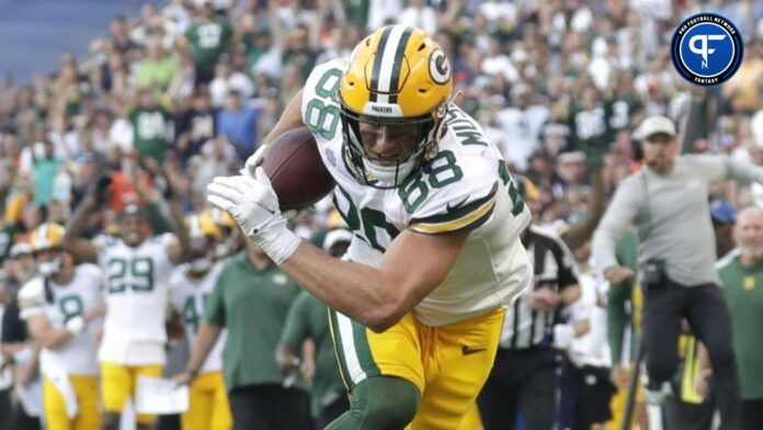 Luke Musgrave (88) is wide open for a long reception in the fourth quarter at Soldier Field.