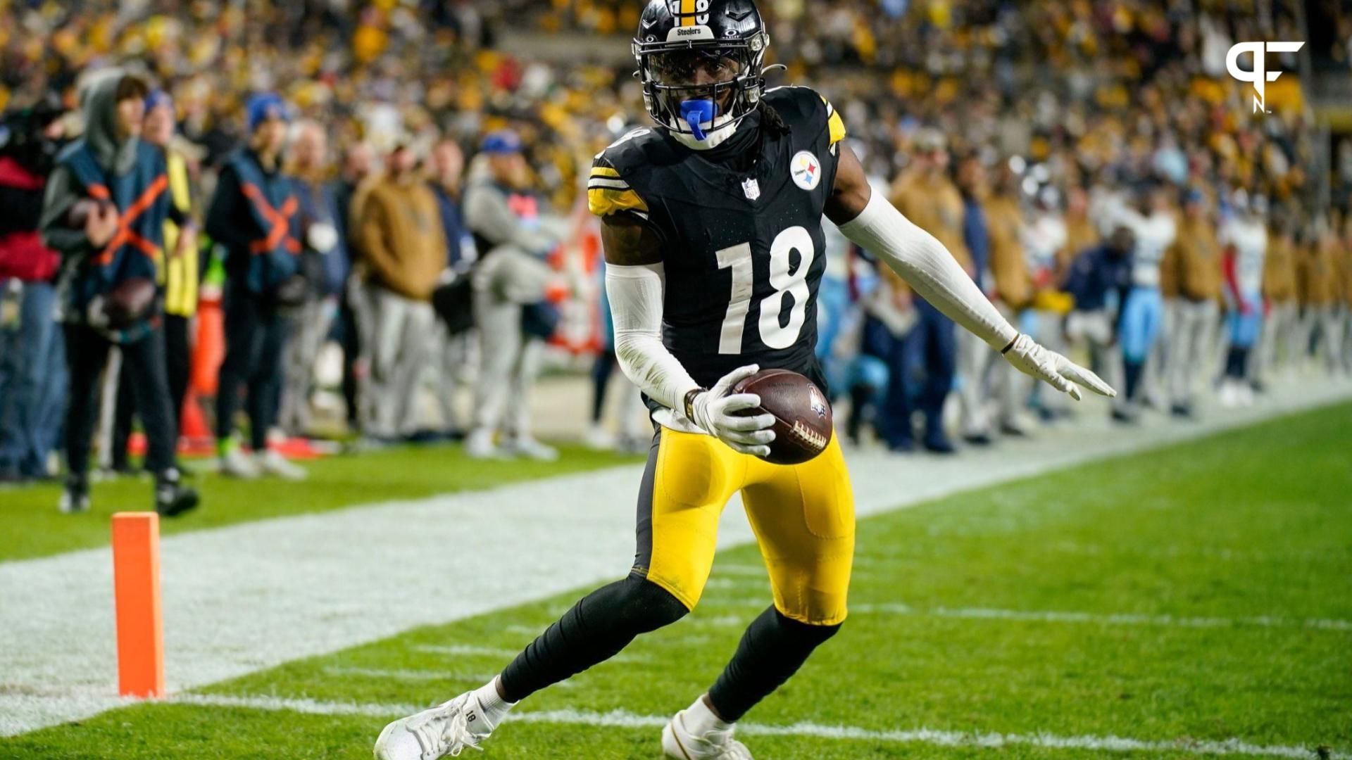 Pittsburgh Steelers WR Diontae Johnson (18) scores a touchdown against the Tennessee Titans.