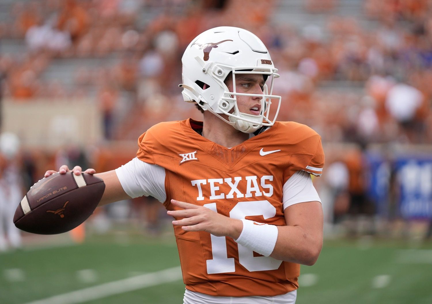 Arch Manning warms up before the game against the BYU Cougars at Royal-Memorial Stadium.