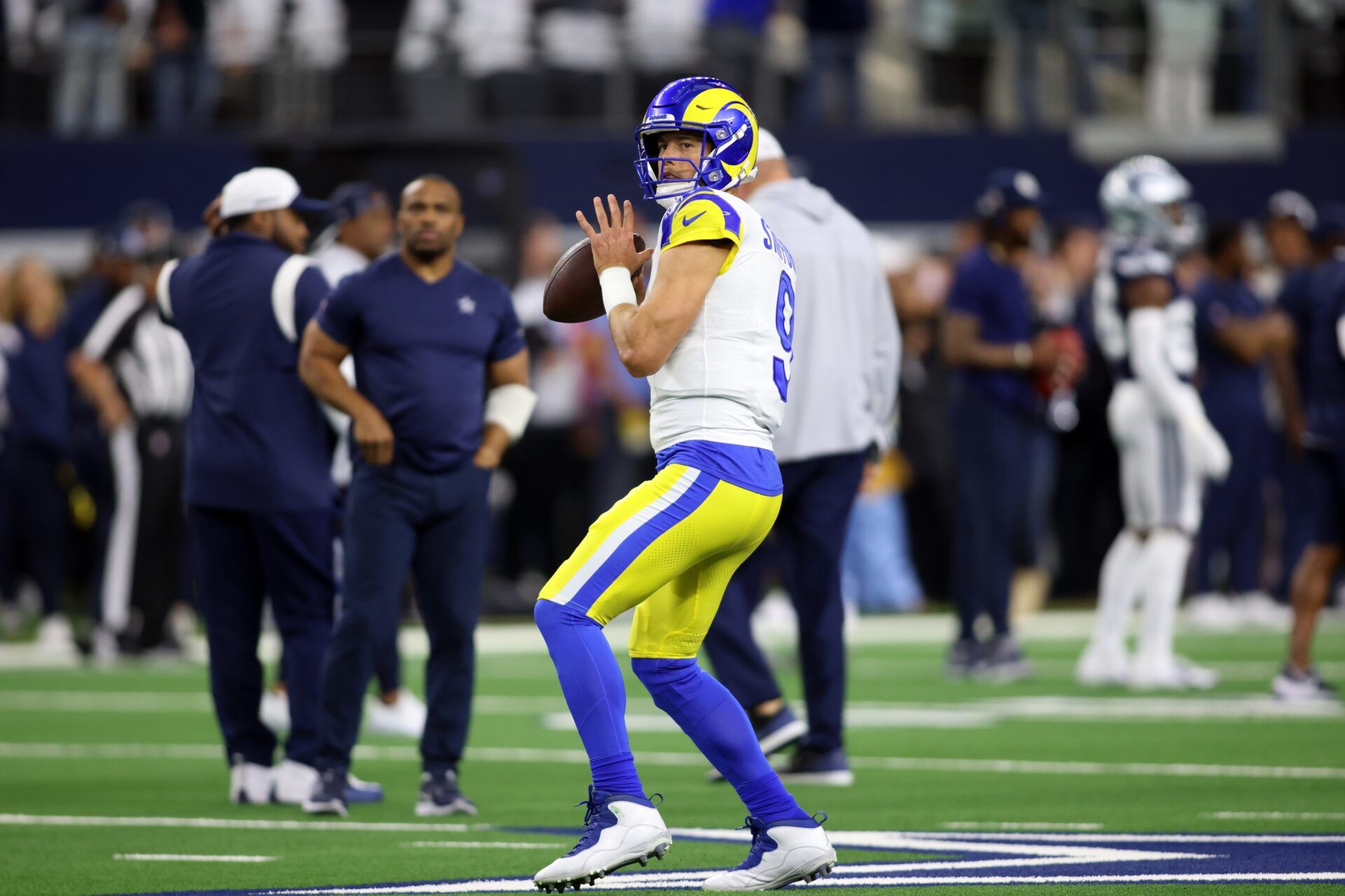 Matthew Stafford (9) throws a pass before the game against the Dallas Cowboys at AT&T Stadium.