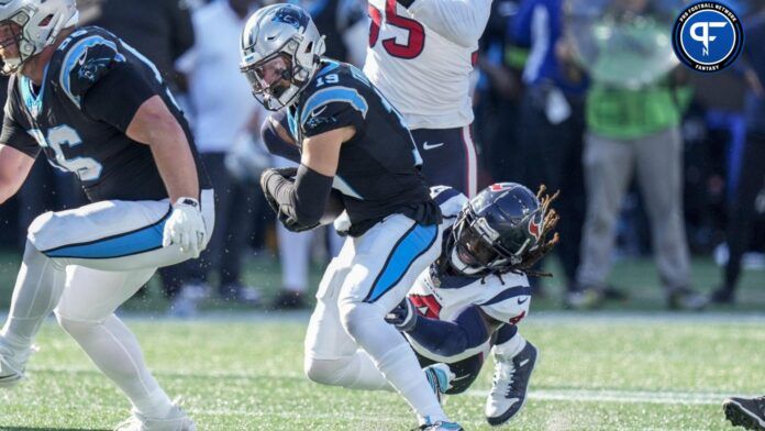 Adam Thielen (19) is tackled at the catch by Houston Texans cornerback Tavierre Thomas (4)during the second half at Bank of America Stadium.