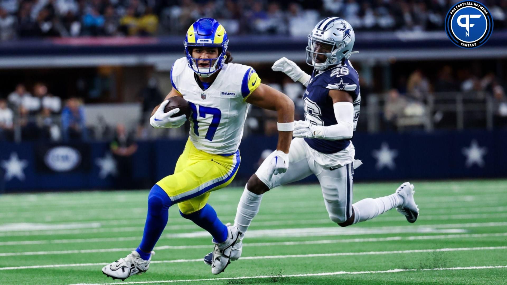 Puka Nacua (17) runs past Dallas Cowboys cornerback DaRon Bland (26) during the first quarter at AT&T Stadium.