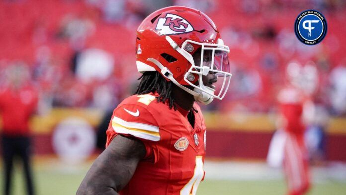 Kansas City Chiefs wide receiver Rashee Rice (4) runs onto the field for warm ups against the Denver Broncos prior to a game at GEHA Field at Arrowhead Stadium.