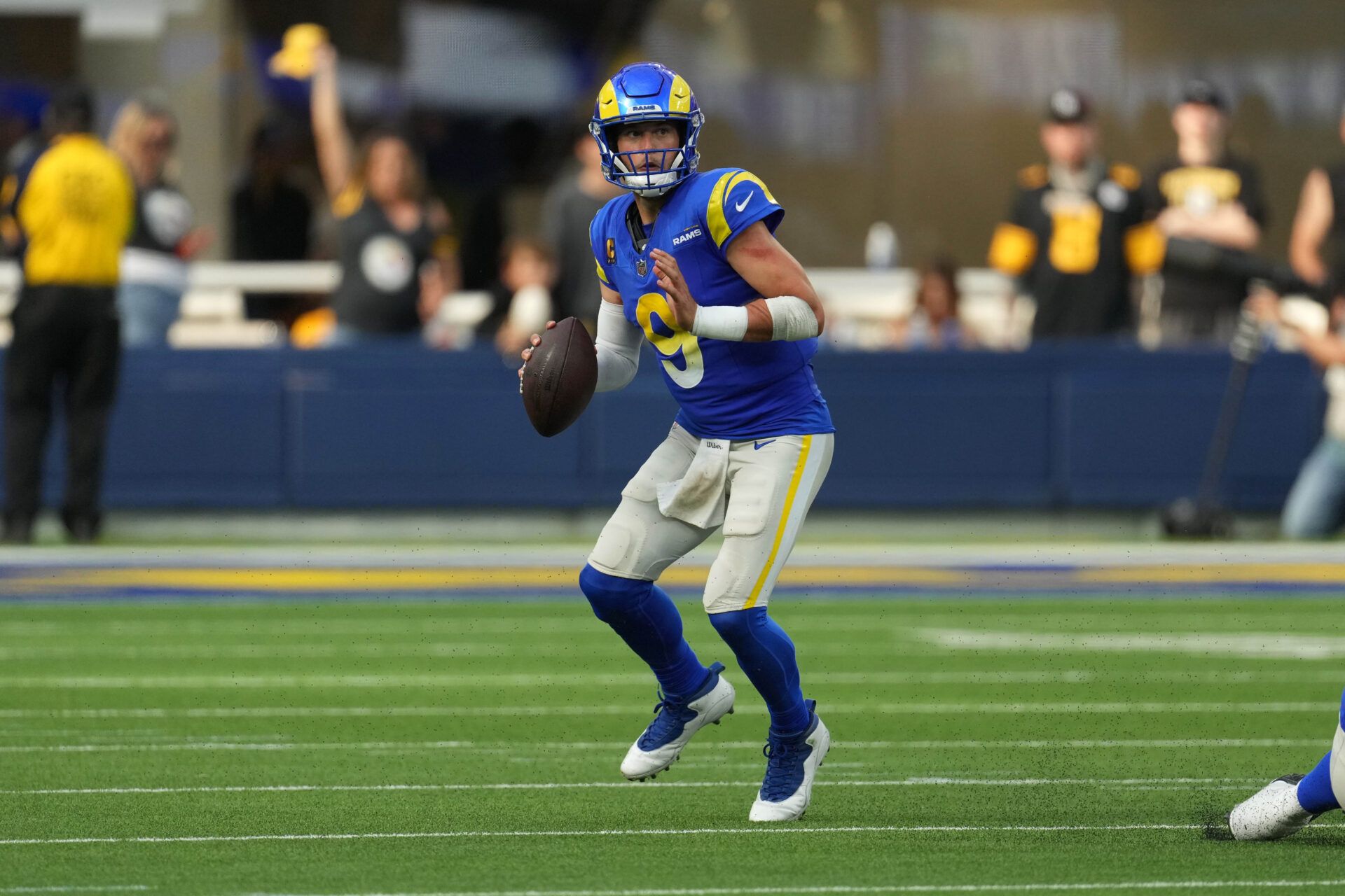 Los Angeles Rams quarterback Matthew Stafford (9) throws the ball against the Pittsburgh Steelers in the second half at SoFi Stadium.