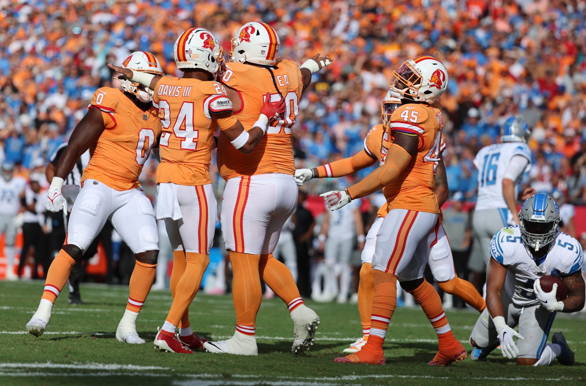 Tampa Bay Buccaneers defensive tackle Vita Vea (50) reacts after he tackles Detroit Lions running back David Montgomery (5) during the first quarter at Raymond James Stadium.