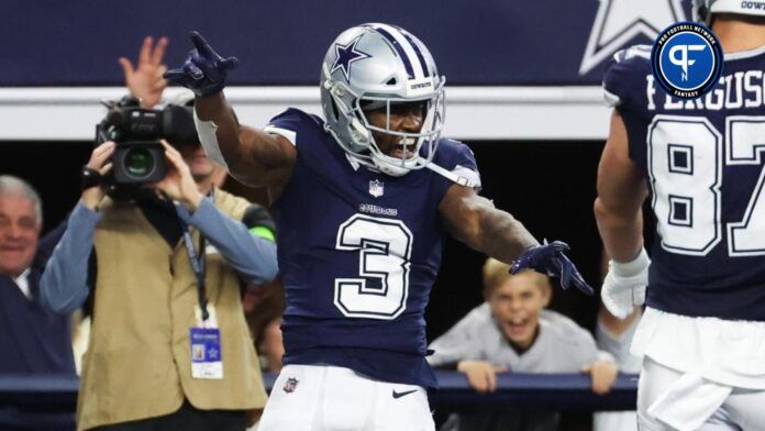 Brandin Cooks (3) celebartes with Dallas Cowboys tight end Jake Ferguson (87) after scoring a touchdown during the fourth quarter against the Los Angeles Rams at AT&T Stadium.