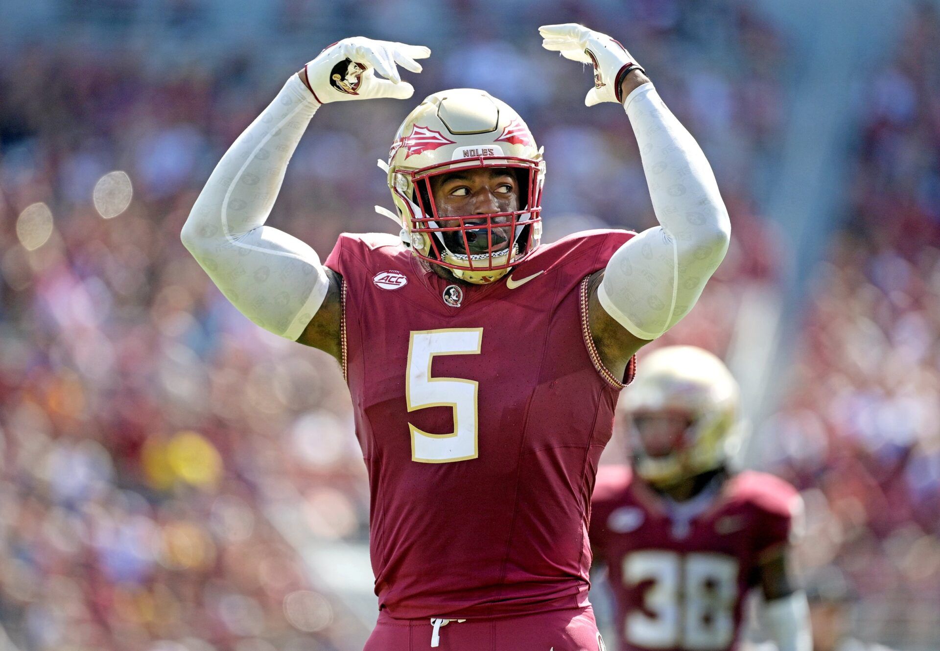 Jared Verse (5) against the Syracuse Orange during the first half at Doak S. Campbell Stadium.