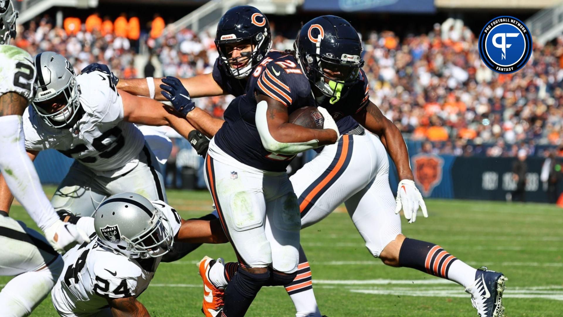 D'Onta Foreman (21) rushes for a touchdown against the Las Vegas Raiders in the second half at Soldier Field.