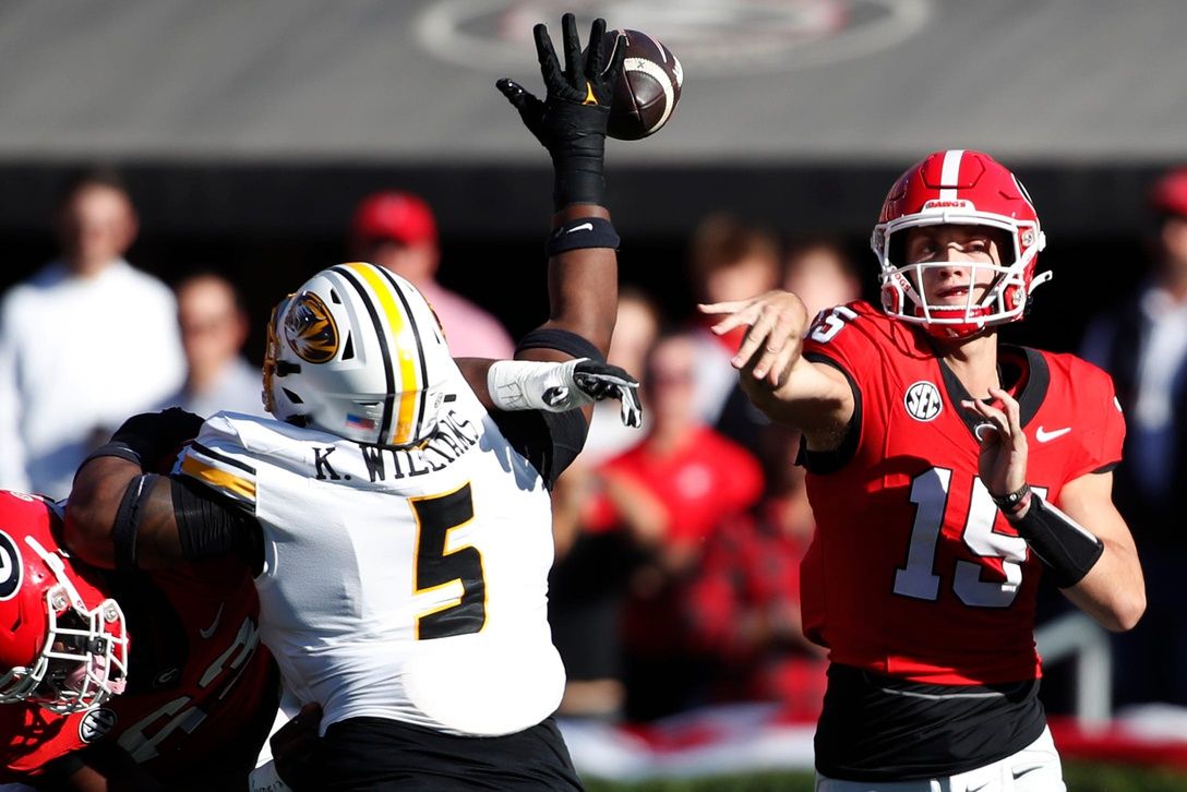 Missouri defensive lineman Kristian Williams (5) deflects a pass from Georgia quarterback Carson Beck (15) during the first half.