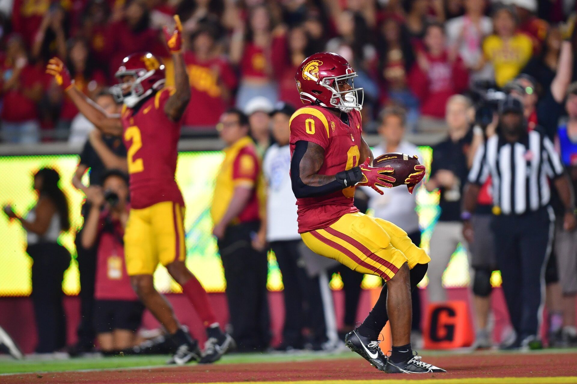 Southern California Trojans running back MarShawn Lloyd (0) scores a touchdown against the Arizona Wildcats during the second half at Los Angeles Memorial Coliseum.